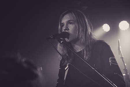 grayscale photo of vocalist thumbnail