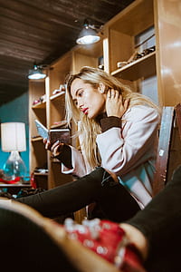 woman sitting on chair holding case thumbnail