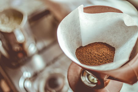 Brown Coffee on White Strainer thumbnail