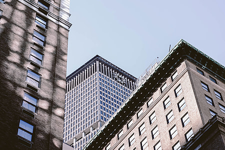 photo of three gray buildings thumbnail