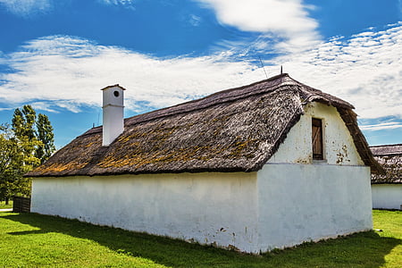 white and brown building on blue skies thumbnail