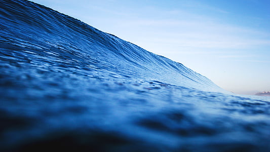 ripling body of water at daytime thumbnail