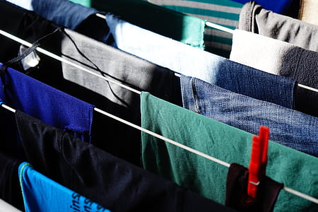 assorted-color clothes in strings thumbnail
