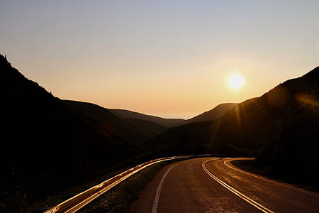 photo of empty road during sunset thumbnail