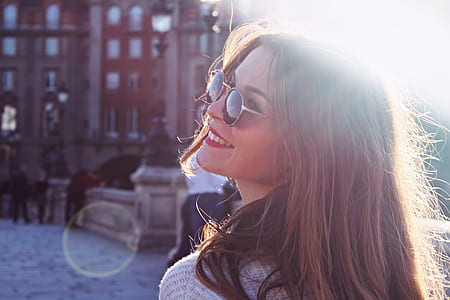 woman in sunglasses near birdge thumbnail