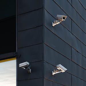 photography of three bullet security cameras thumbnail