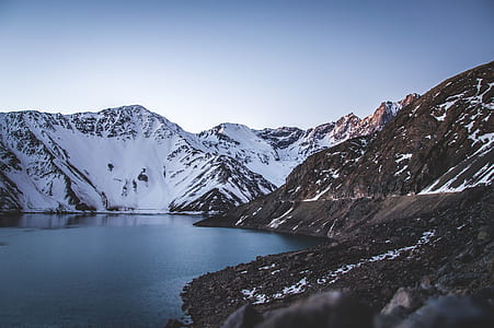 mountain near body of water thumbnail