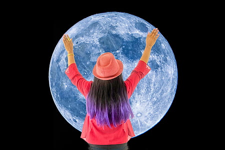 woman holding full moon art thumbnail