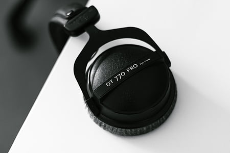black DT 770 Pro headphones placed on white wooden shelf thumbnail