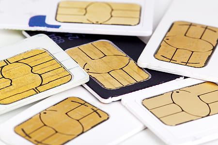 whit and black SIM cards close-up photo thumbnail