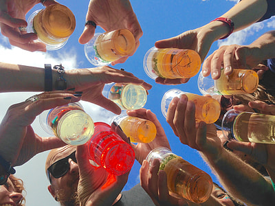 person holding plastic juice container thumbnail