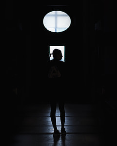 person standing near window thumbnail