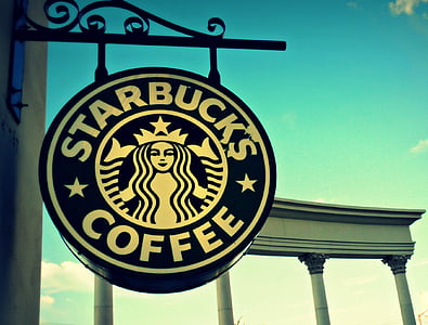 Starbucks Coffee signage hanging at daytime thumbnail
