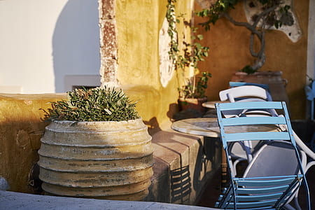 blue chair leaning on table thumbnail