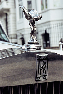 gray Rolls Royce vehicle hood ornament thumbnail