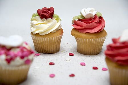selective focus photography of two cupcakes thumbnail