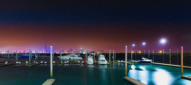 White Yacht at the Dock during Nighttime thumbnail