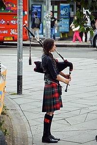 woman playing wind instrument thumbnail