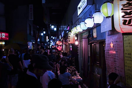 white ball lantern hanging under storefrunt thumbnail