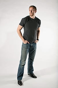 man posing with his hands in pocket thumbnail