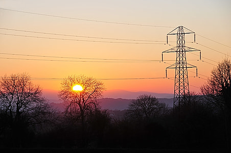 electricity transformer tower during golden hour thumbnail