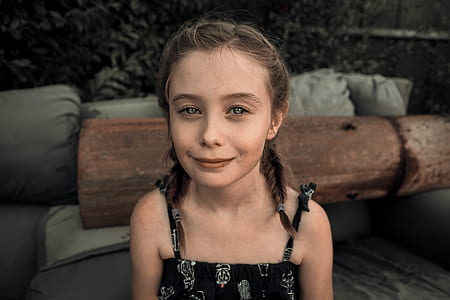 girl wearing black and grey sleeveless dress thumbnail
