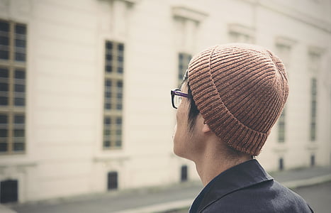 man wearing brown knit cap thumbnail