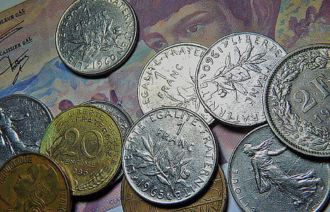 close view of coins and banknote thumbnail