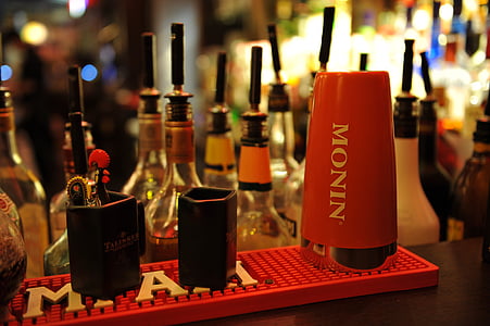 red Monin container on red plastic tray thumbnail