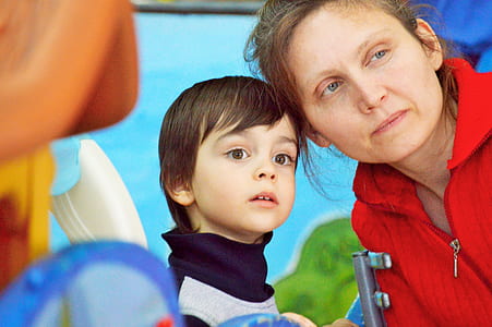 woman near face of boy thumbnail