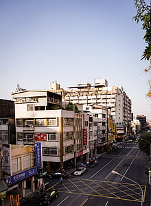 white concrete buildings under blue sky thumbnail