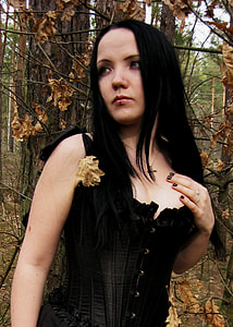 woman standing near tree at daytime thumbnail