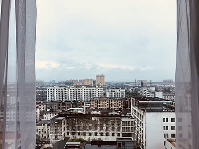 white concrete building during daytime thumbnail