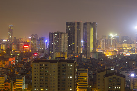 city building lights during night time thumbnail