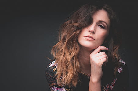 woman in black and purple top thumbnail