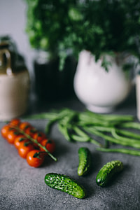 Parslel, cucumbers, green peas, and other greenery thumbnail