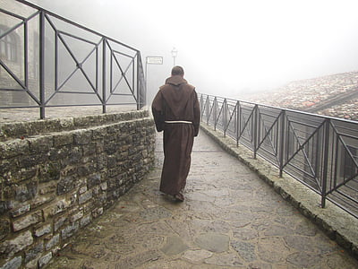 man wearing brown suit thumbnail