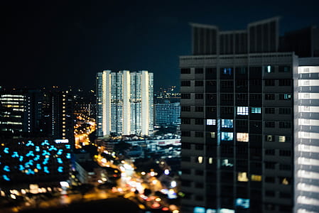 high angle photography of gray curtain building during nighttime thumbnail