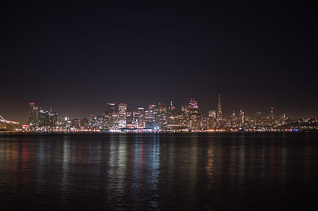 landscape photo of city building during night time thumbnail