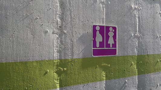 photo of purple and white pregnant signage on wall thumbnail