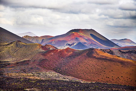 landscape photography of mountains under nimbus clouds thumbnail