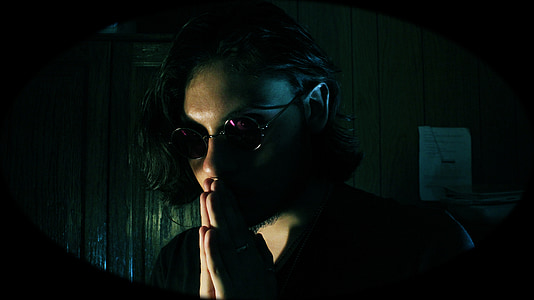 woman in black top wearing sunglasses thumbnail