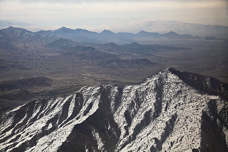 aerial photo of mountain tops during daytime thumbnail
