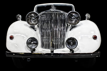 classic white convertible vehicle in closed-up photo thumbnail