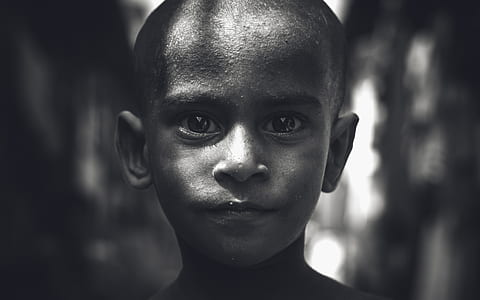 closeup grayscale photo of kid thumbnail