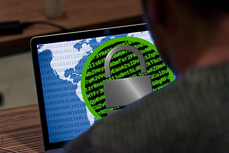person in front of laptop computer thumbnail