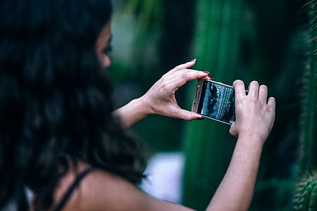 person, hands, woman, camera thumbnail