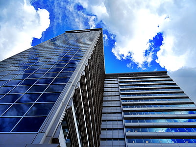 low-angle photography of high-rise glass building thumbnail