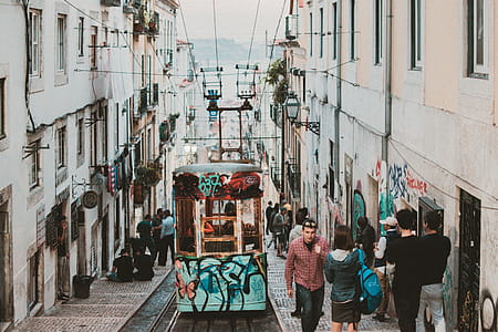 Photo of People Walking Beside Tram Train thumbnail