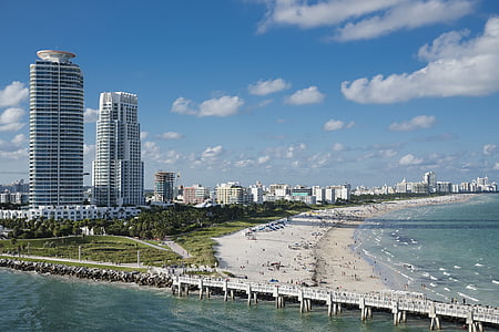 aerial photography of white bridge near beach shore thumbnail
